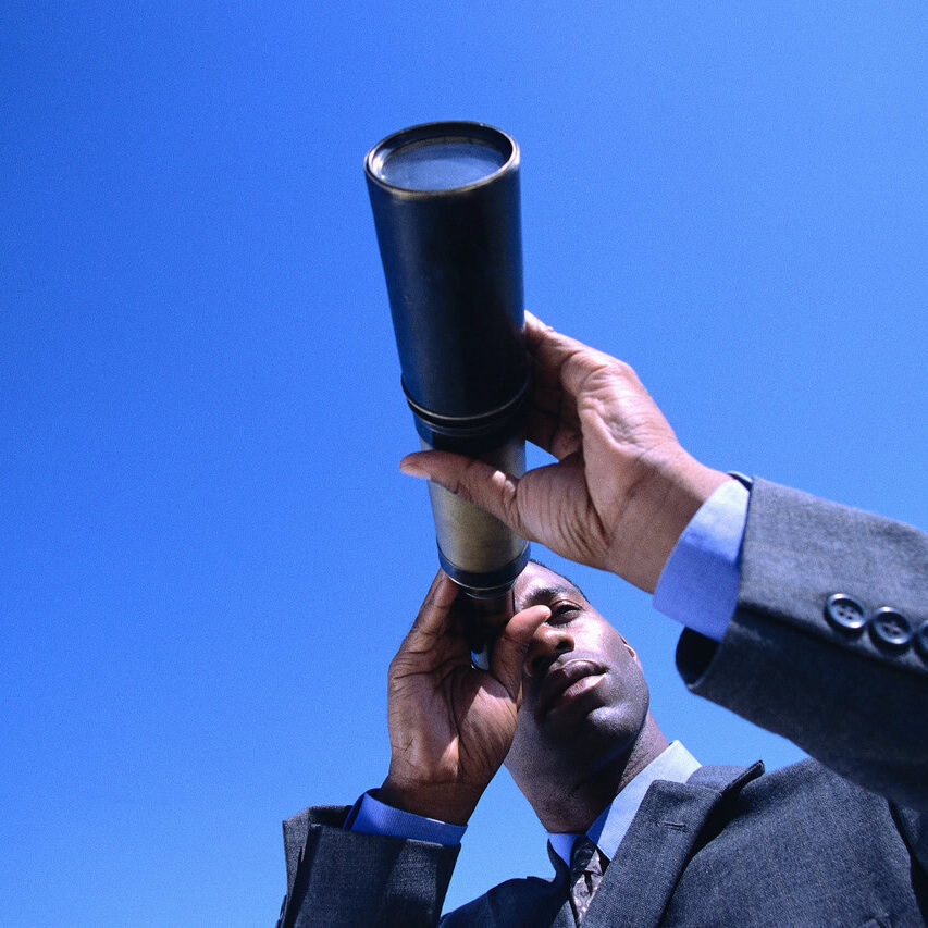 Man Holding Telescope